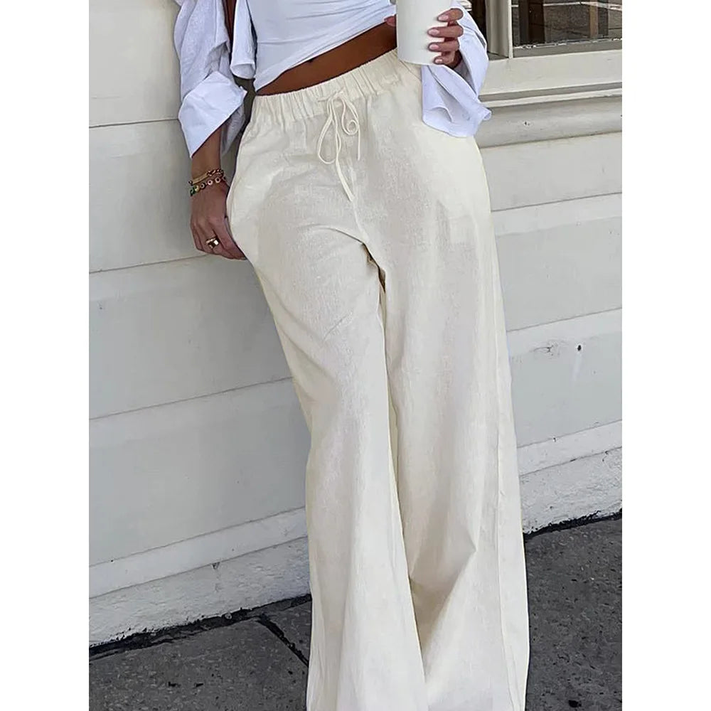 Women's simple soild-color drawstring casual pants,They are loose, trendy, straight-tube style, lazy and comfortable.