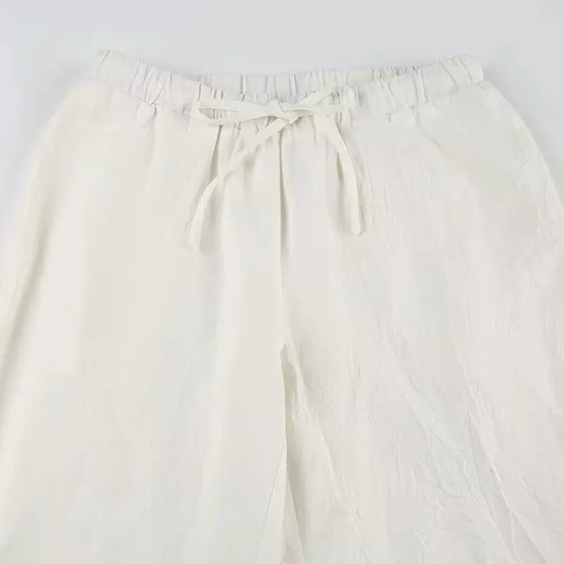 Women's simple soild-color drawstring casual pants,They are loose, trendy, straight-tube style, lazy and comfortable.