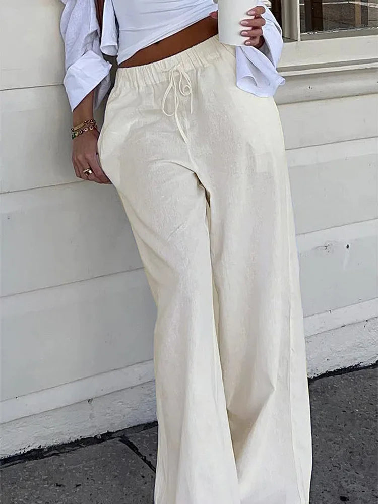 Women's simple soild-color drawstring casual pants,They are loose, trendy, straight-tube style, lazy and comfortable.