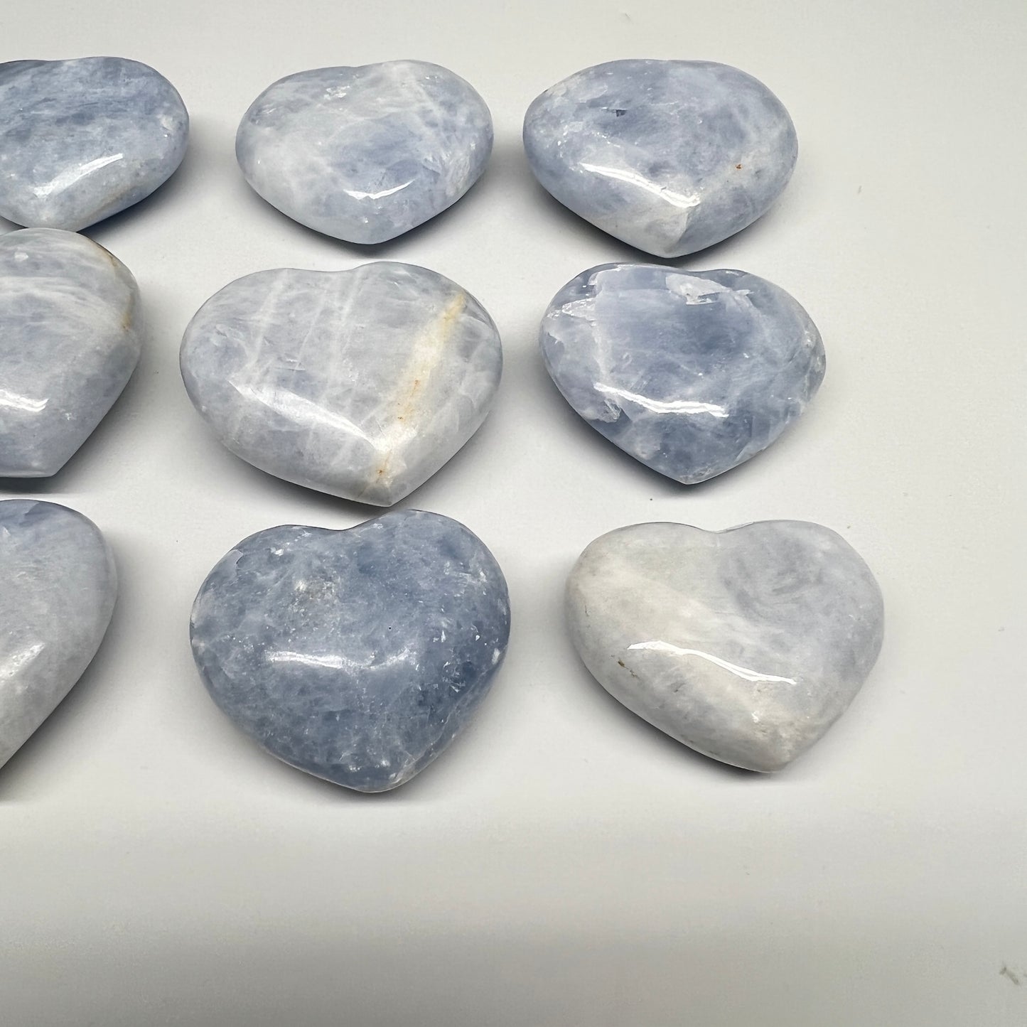 1040g (2.2 lbs) , 9 pcs, 1.7"- 2.3", Blue Calcite Hearts from Madagascar, B20854