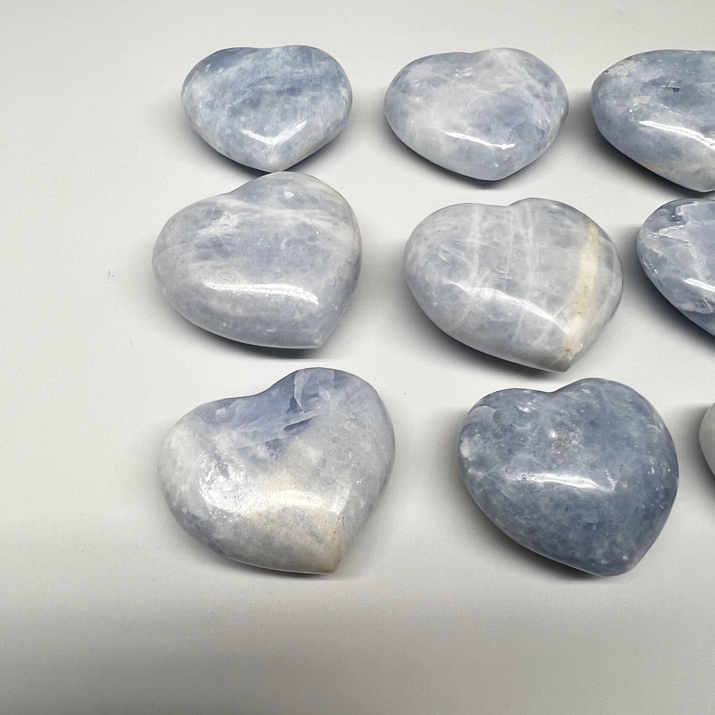 1040g (2.2 lbs) , 9 pcs, 1.7"- 2.3", Blue Calcite Hearts from Madagascar, B20854