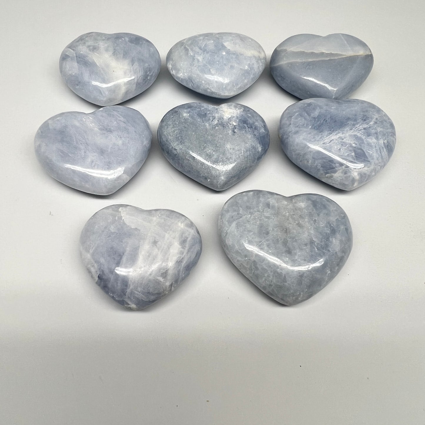 1025g (2.2 lbs) , 8 pcs, 1.9"- 2.2", Blue Calcite Hearts from Madagascar, B20855