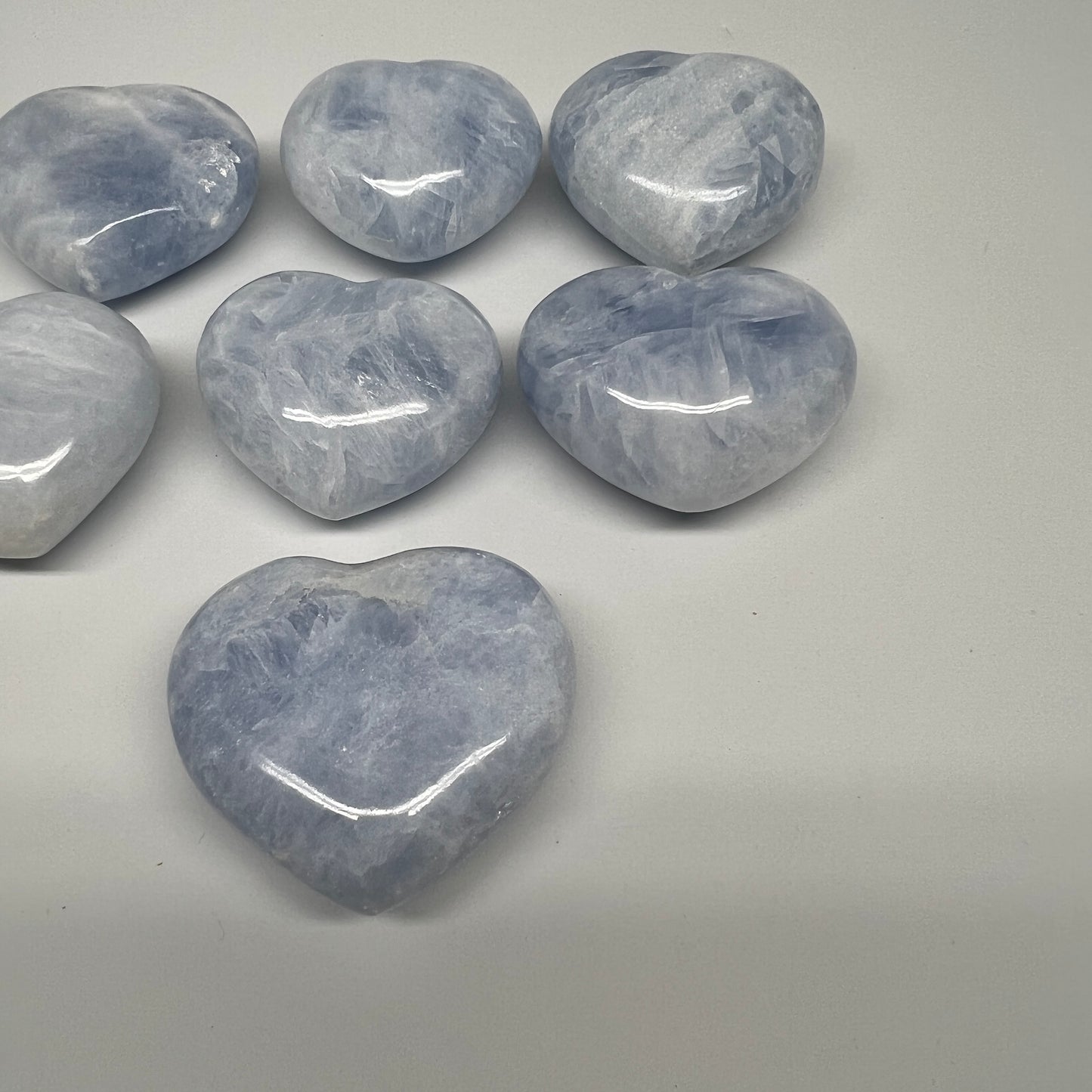 1010g (2.2 lbs) , 7 pcs, 2"- 2.3", Blue Calcite Hearts from Madagascar, B20856